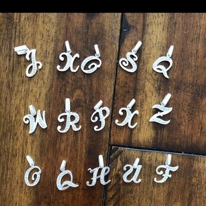 Letter pendant, silver.